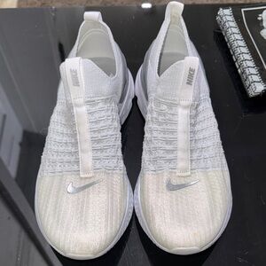 Nike White and Silver Knit Sneakers
